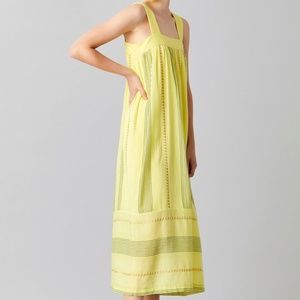 Megan Park sundress in butter yellow with gold accents